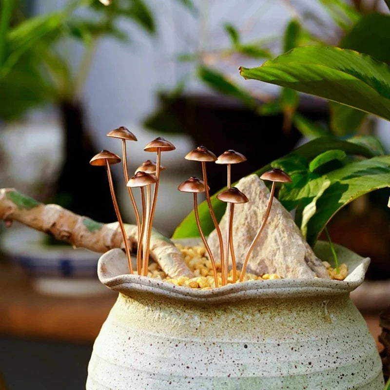 Creative Metal Simulation Mushroom Courtyard Decoration, featuring lifelike metal mushrooms in a natural, whimsical setting