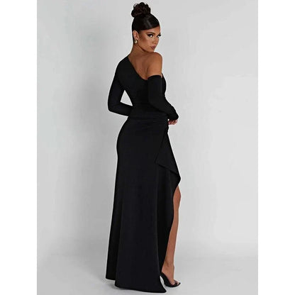 Elegant wine red maxi dress with oblique shoulder design, thigh-high split, and backless feature for sophisticated evening wear