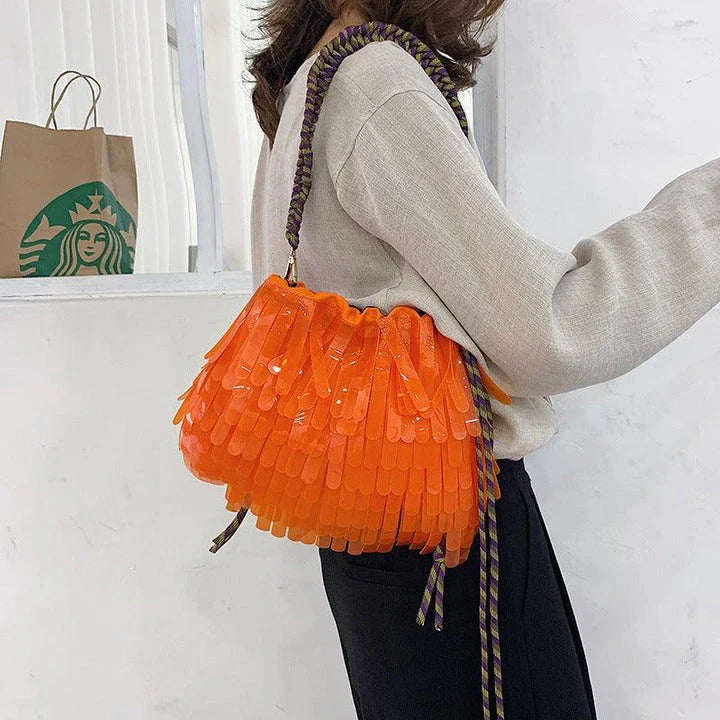 A stylish, jelly-like shoulder messenger bag in a vibrant green colour, featuring a sleek horizontal square shape and a convenient withdraw opening.