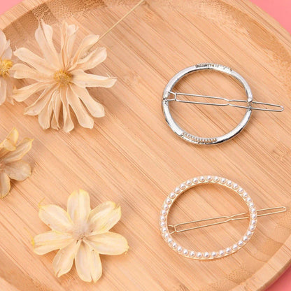 Elegant pearl and geometric hairpins in silver round design, perfect for adding sophistication to hairstyles