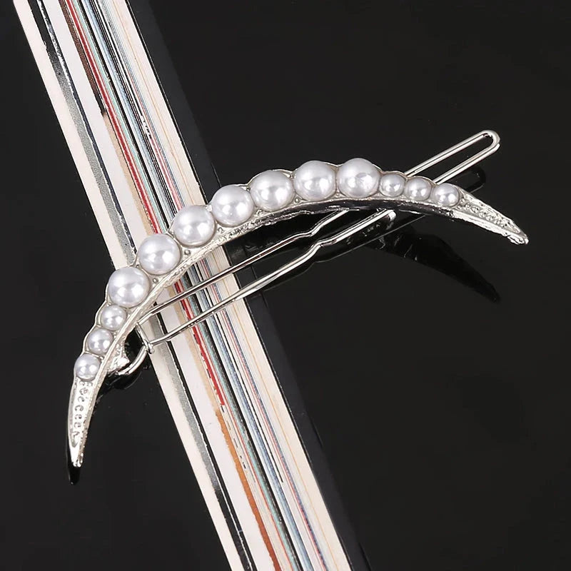 Elegant pearl and geometric hairpins in silver round design, perfect for adding sophistication to hairstyles