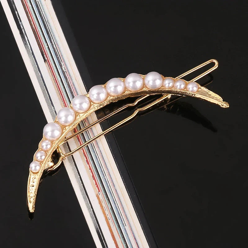 Elegant pearl and geometric hairpins in silver round design, perfect for adding sophistication to hairstyles