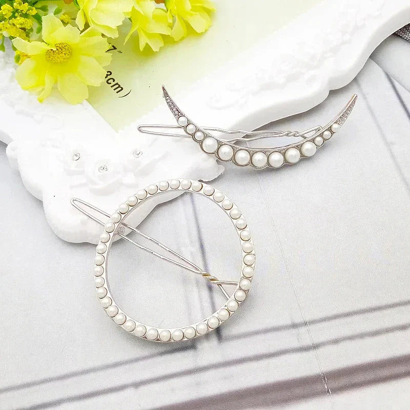 Elegant pearl and geometric hairpins in silver round design, perfect for adding sophistication to hairstyles