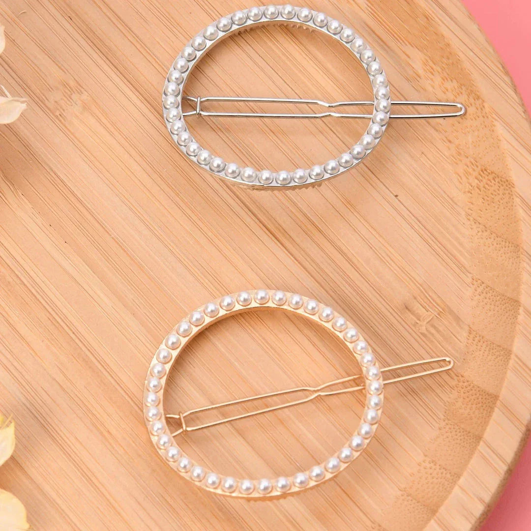 Elegant pearl and geometric hairpins in silver round design, perfect for adding sophistication to hairstyles