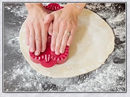 Halloween-themed one-press hand pie maker with pumpkin, circle, and acorn shaped molds for easy homemade pastry creation