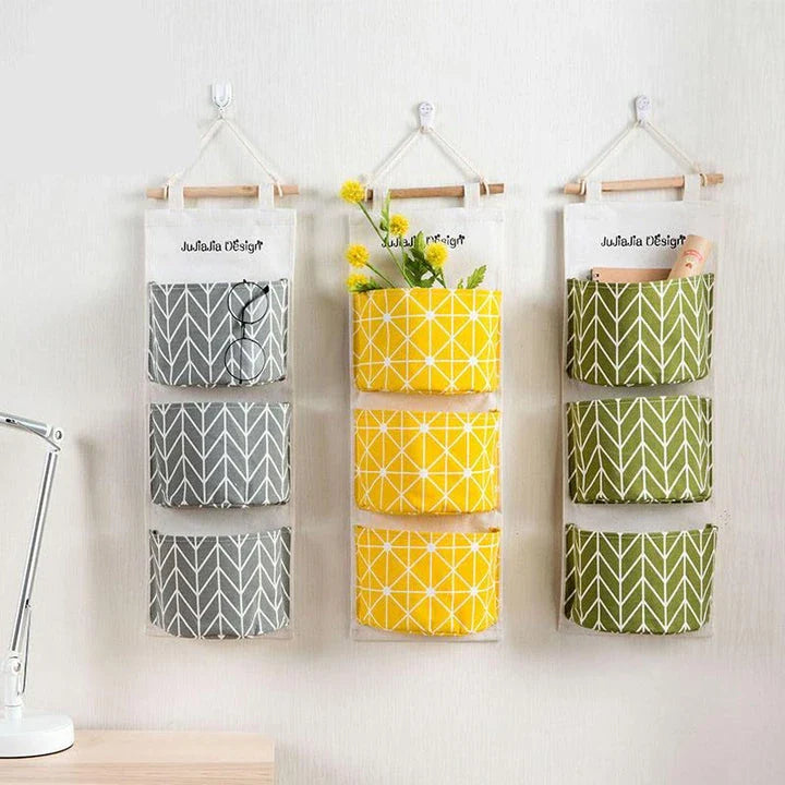 Hanging Storage Bag made from durable linen cloth with waterproof coating, featuring three spacious pockets for convenient organisation