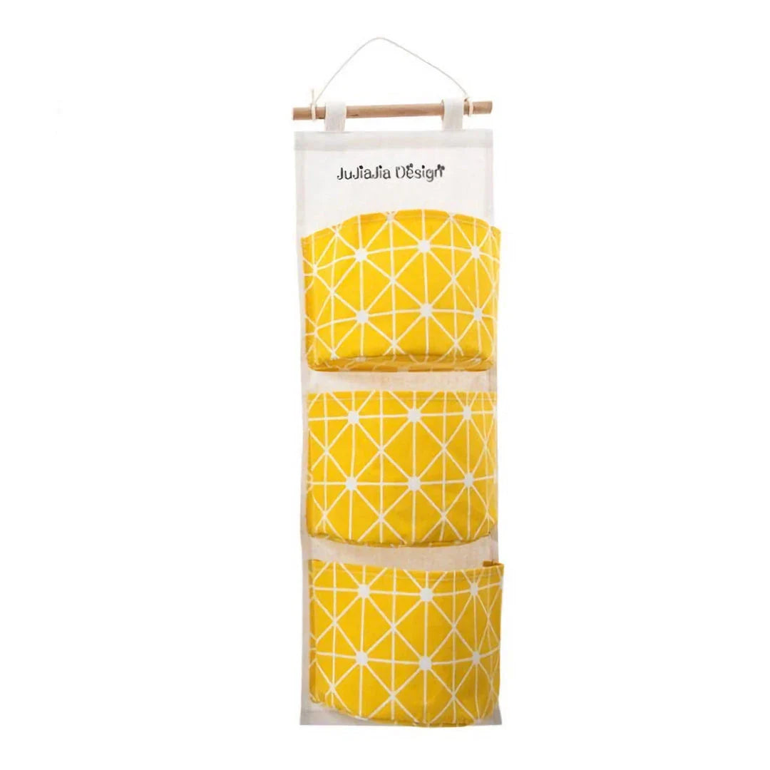 Hanging Storage Bag made from durable linen cloth with waterproof coating, featuring three spacious pockets for convenient organisation