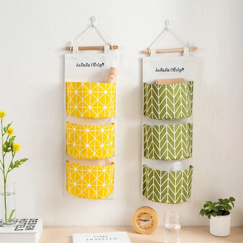 Hanging Storage Bag made from durable linen cloth with waterproof coating, featuring three spacious pockets for convenient organisation