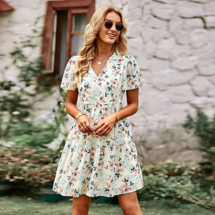 Elegant V-neck chiffon A-line dress with flying sleeves, suitable for office, casual outings, and special occasions