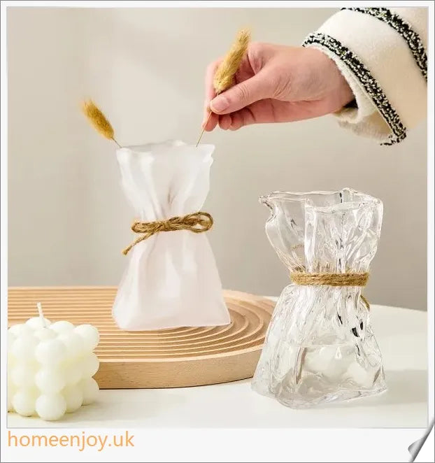 Elegant glass vase with dried flower arrangement, a sophisticated home decor accent
