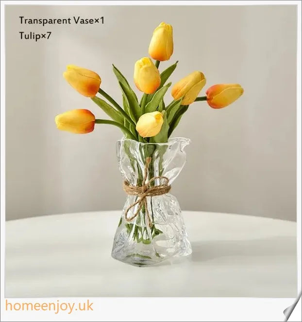 Elegant glass vase with dried flower arrangement, a sophisticated home decor accent