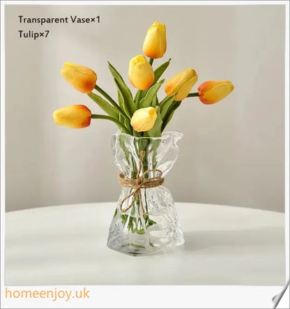 Elegant glass vase with dried flower arrangement, a sophisticated home decor accent