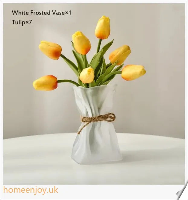 Elegant glass vase with dried flower arrangement, a sophisticated home decor accent