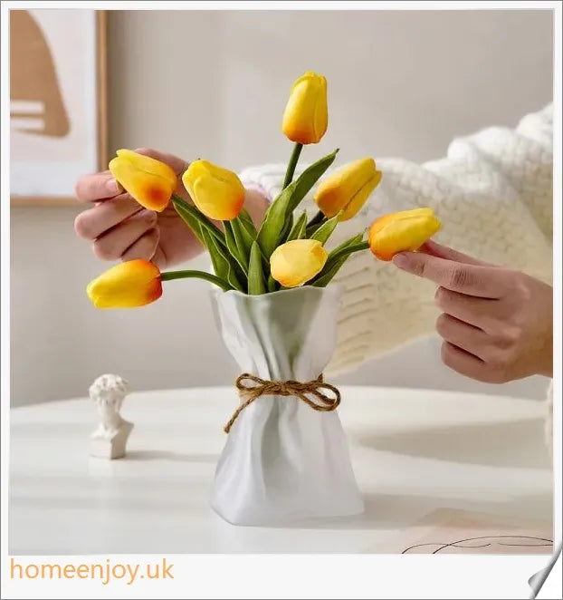 Elegant glass vase with dried flower arrangement, a sophisticated home decor accent