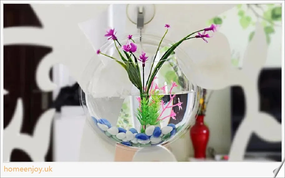 Elegant wall-mounted Betta fish aquarium made of transparent acrylic, showcasing aquatic pets in a stylish and space-saving display.