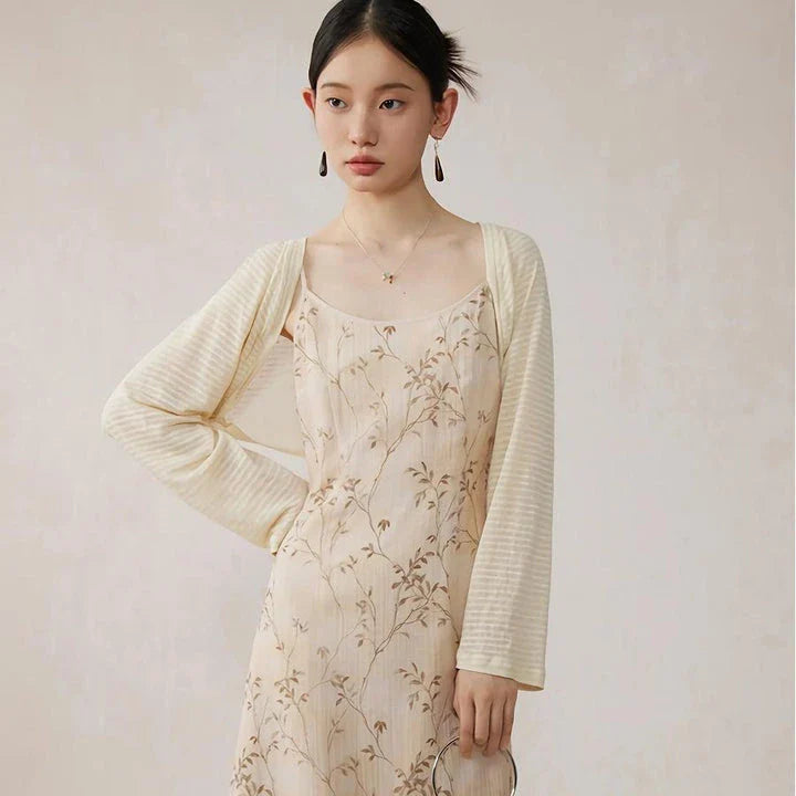 Elegant floral A-line midi dress with lace details, perfect for summer occasions