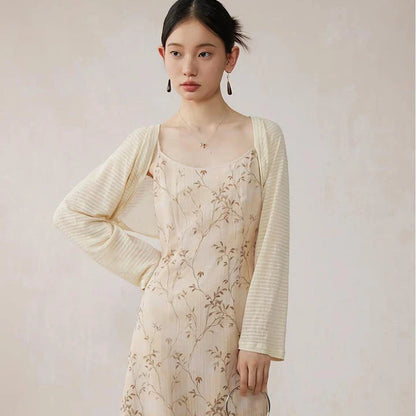 Elegant floral A-line midi dress with lace details, perfect for summer occasions
