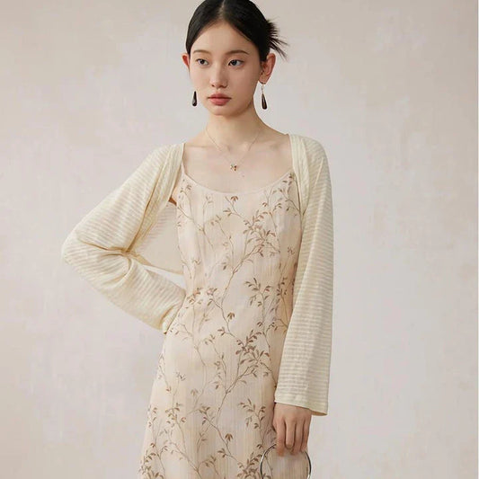 Elegant floral A-line midi dress with lace details, perfect for summer occasions