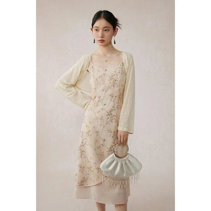 Elegant floral A-line midi dress with lace details, perfect for summer occasions
