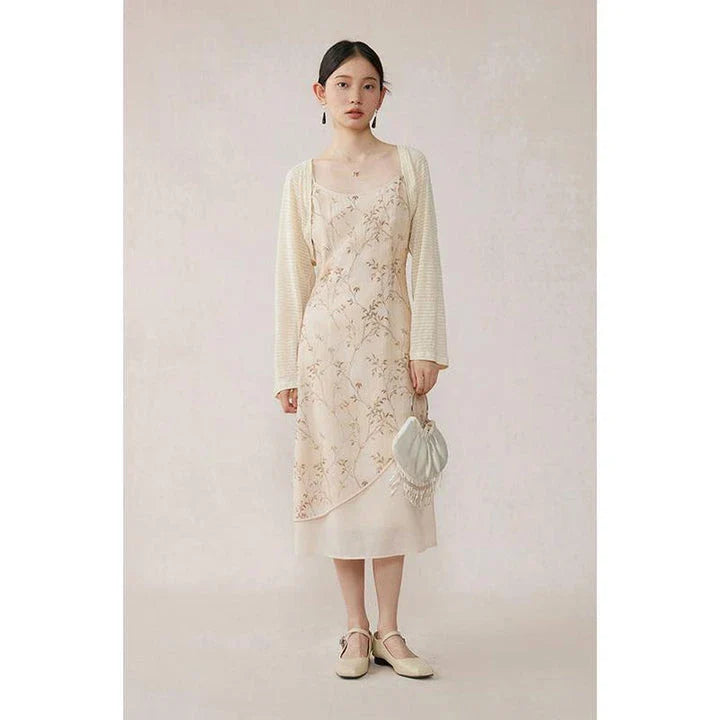 Elegant floral A-line midi dress with lace details, perfect for summer occasions