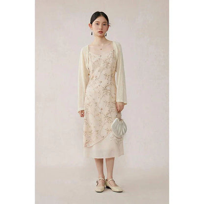 Elegant floral A-line midi dress with lace details, perfect for summer occasions