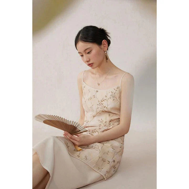 Elegant floral A-line midi dress with lace details, perfect for summer occasions