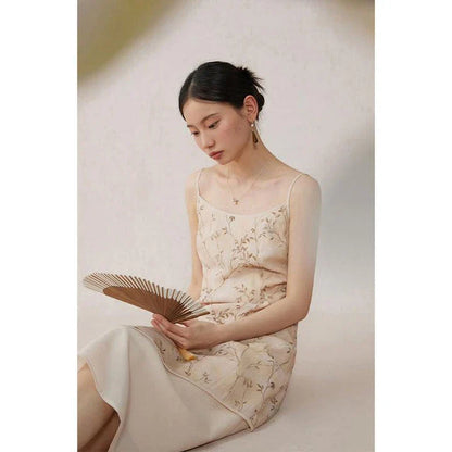 Elegant floral A-line midi dress with lace details, perfect for summer occasions