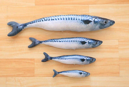Catnip-filled plush fish toy for cats in various sizes, designed to satisfy scratching and chewing instincts