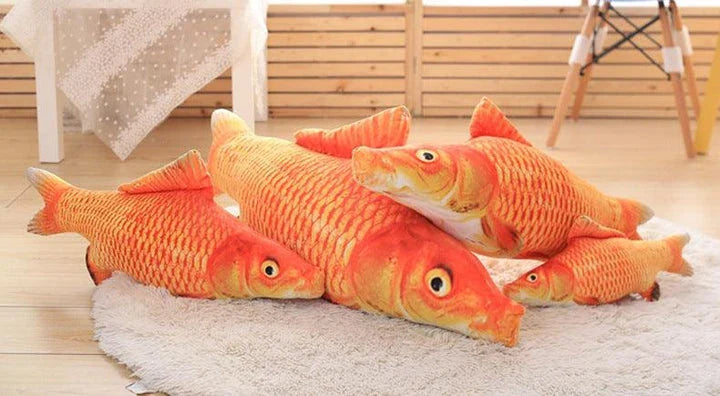 Catnip-filled plush fish toy for cats in various sizes, designed to satisfy scratching and chewing instincts