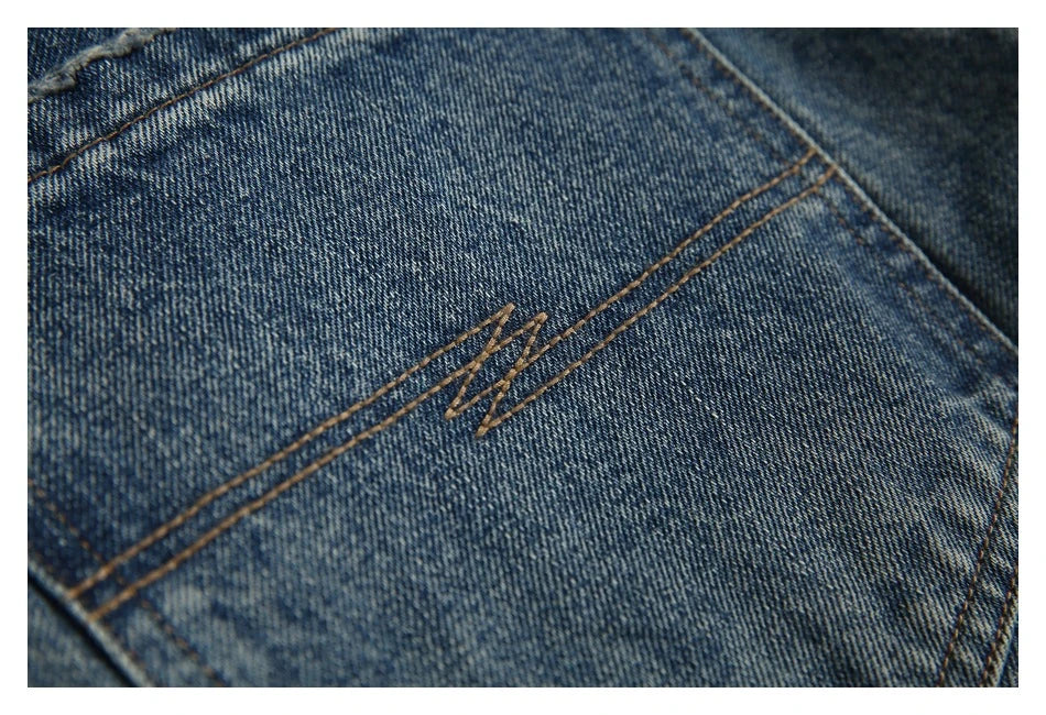 Autumn New Retro Loose Jeans in dark blue, featuring a tapered leg design and unique printing techniques for a vintage-inspired look.