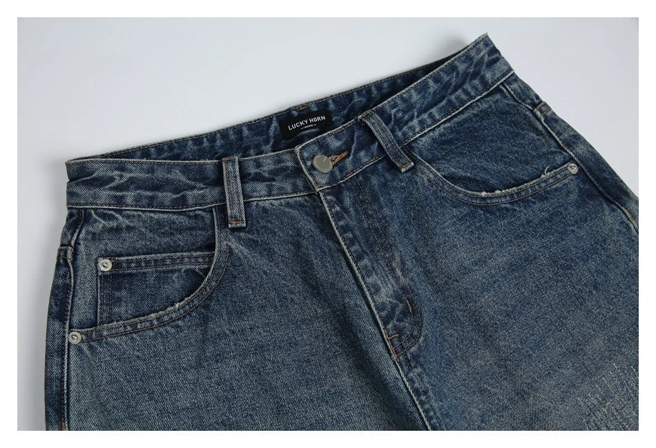 Autumn New Retro Loose Jeans in dark blue, featuring a tapered leg design and unique printing techniques for a vintage-inspired look.