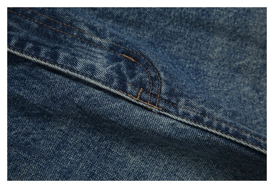 Autumn New Retro Loose Jeans in dark blue, featuring a tapered leg design and unique printing techniques for a vintage-inspired look.