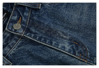 Autumn New Retro Loose Jeans in dark blue, featuring a tapered leg design and unique printing techniques for a vintage-inspired look.