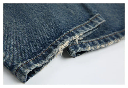 Autumn New Retro Loose Jeans in dark blue, featuring a tapered leg design and unique printing techniques for a vintage-inspired look.