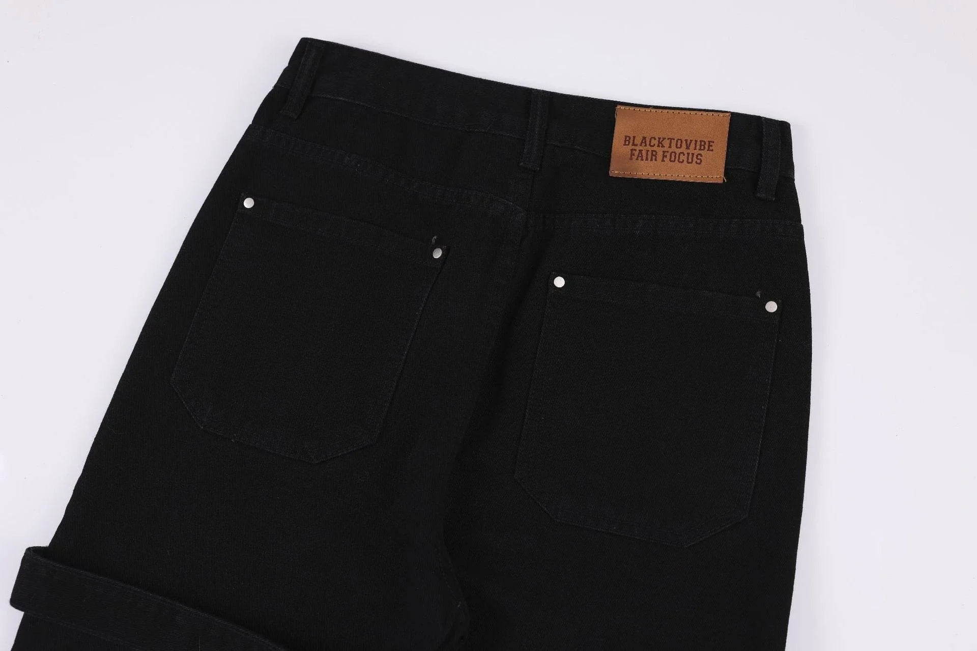 Distressed heavy industry straight casual jeans in black, featuring a premium denim construction and a lived-in, street-style inspired look.