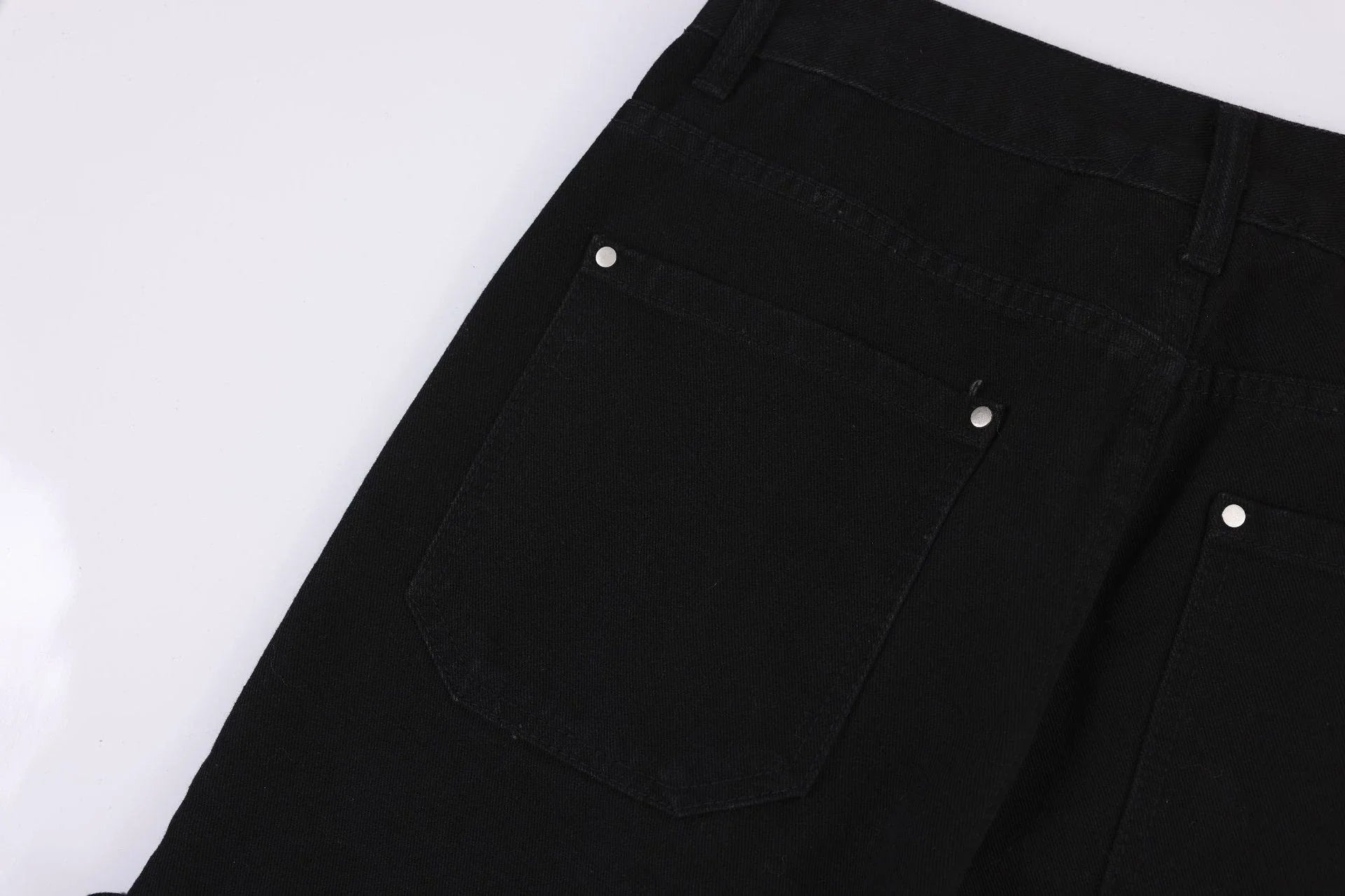 Distressed heavy industry straight casual jeans in black, featuring a premium denim construction and a lived-in, street-style inspired look.