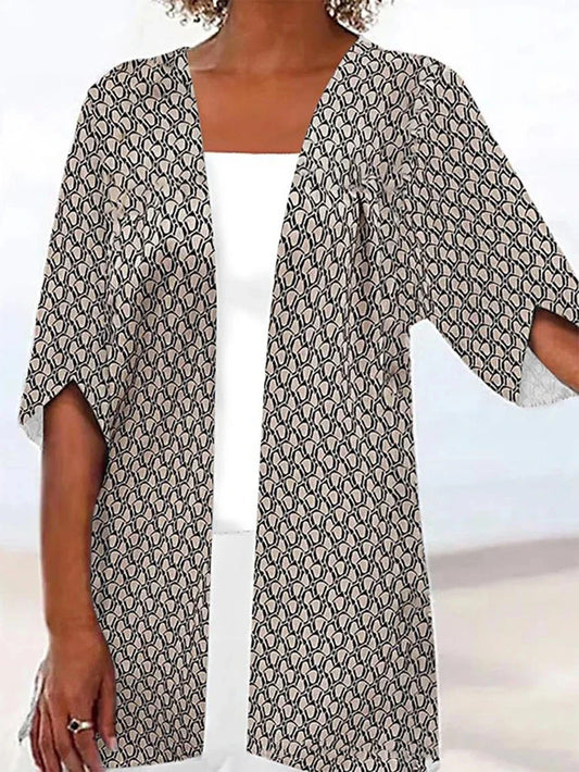Printed Loose Top Fashion Coat in various vibrant colours, featuring a V-shaped collar and 5/4 sleeves for a modern, stylish look.