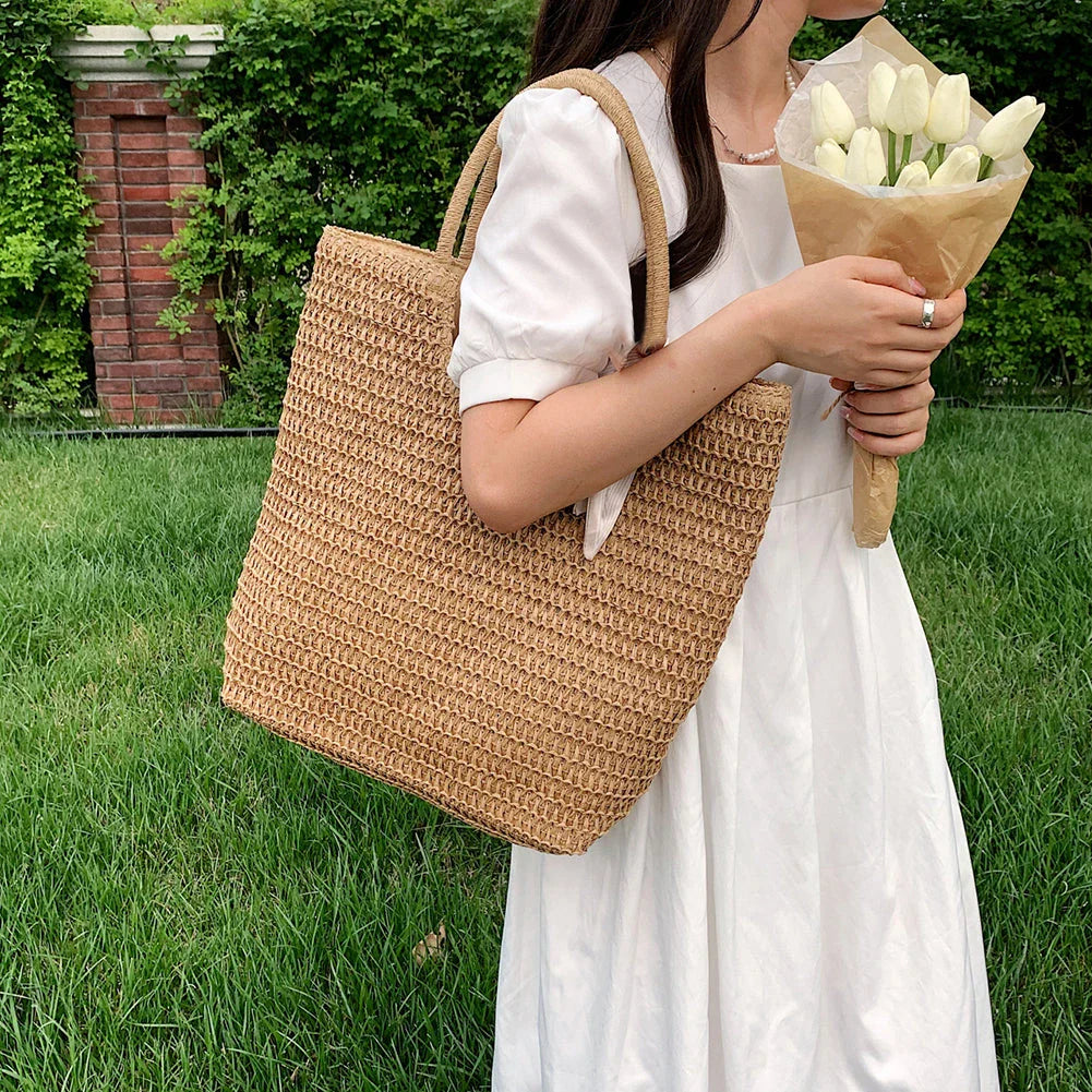 Handmade straw woven shoulder bag in beige, a stylish and versatile summer accessory