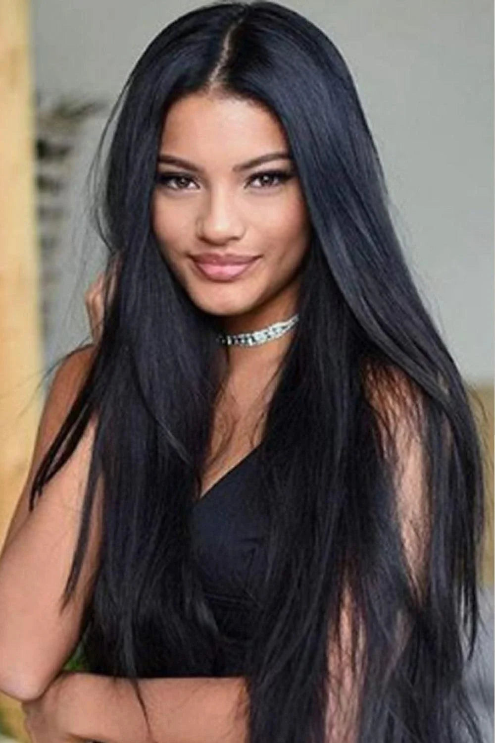 A high-quality 13*2" lace front straight synthetic wig in black, 26" long with 150% density