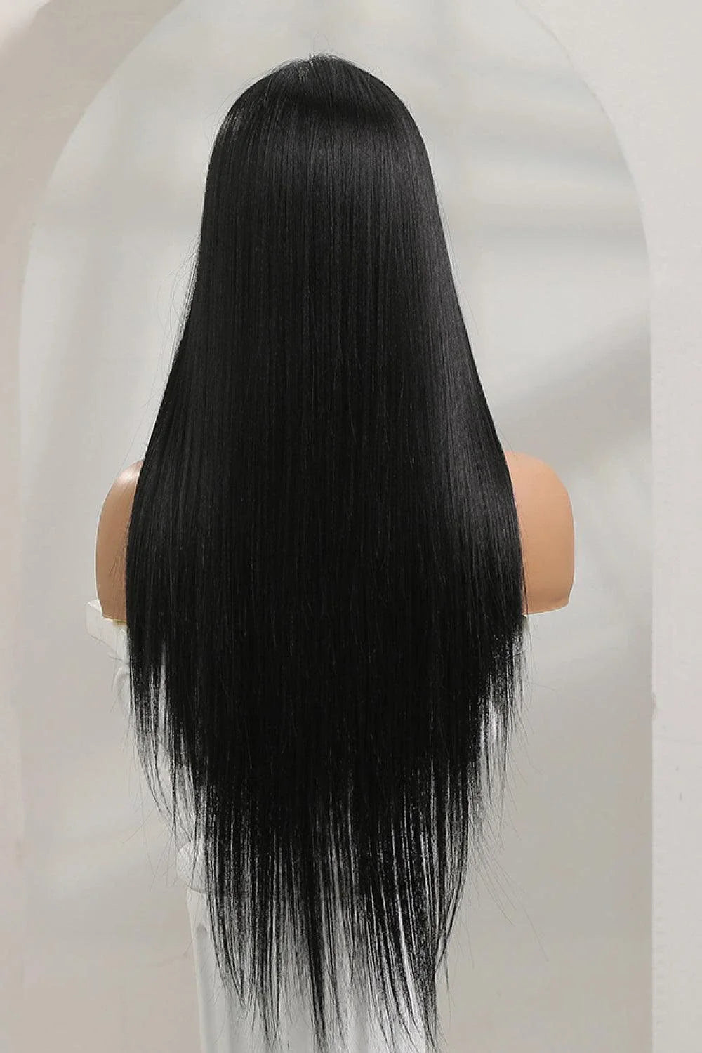 A high-quality 13*2" lace front straight synthetic wig in black, 26" long with 150% density