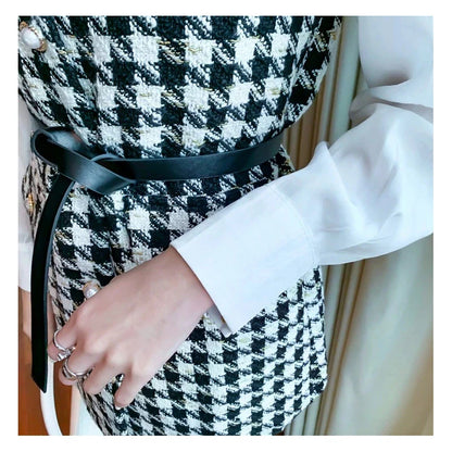 Lightly Cooked Temperament Yujie Fried Street Small Incense Wind Vest Two-Piece Suit in a check pattern, featuring a high-waisted skirt and a vest top