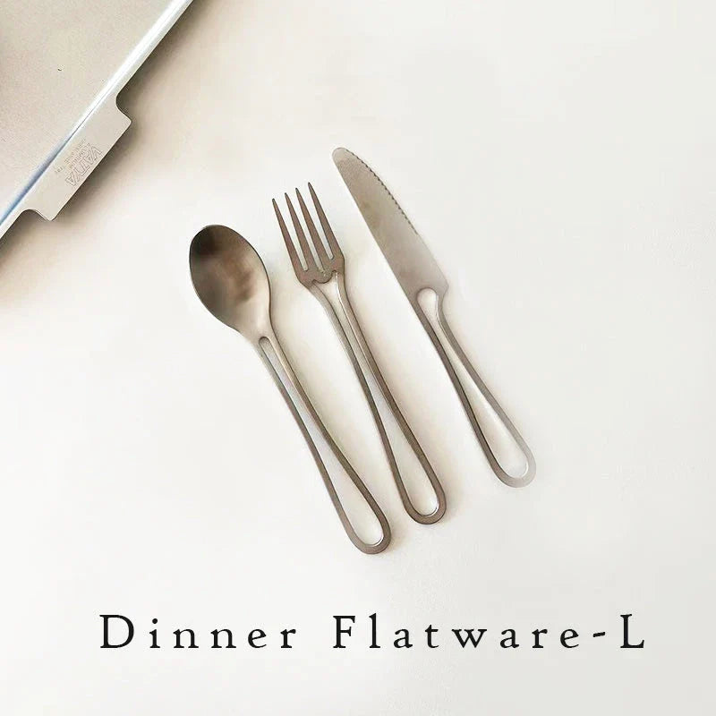 Trendha 304 Stainless Steel Cutlery Set - Sleek black finish, durable construction, and contemporary design for an elevated dining experience.