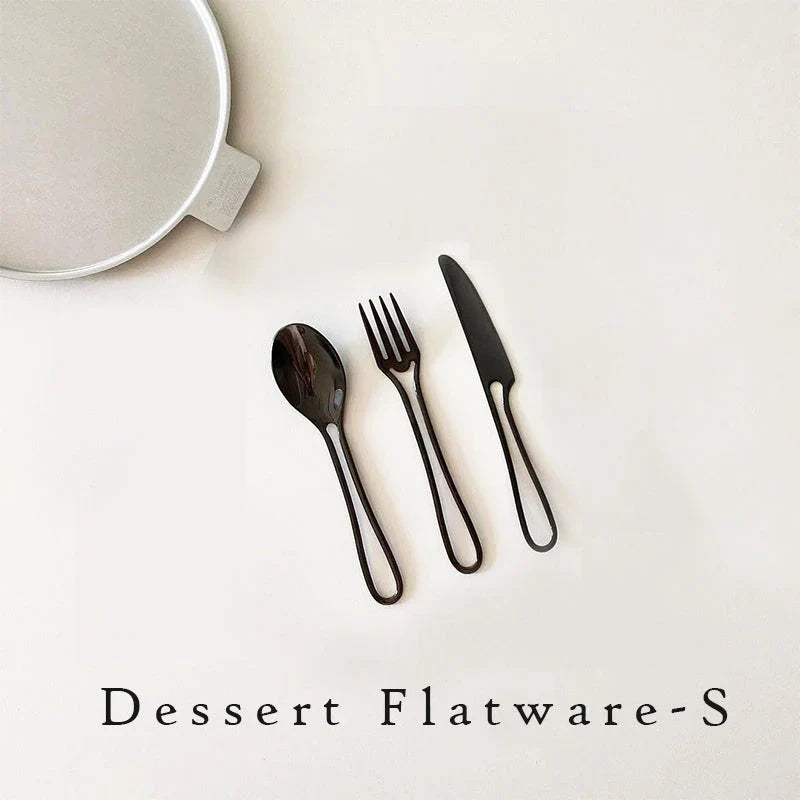 Trendha 304 Stainless Steel Cutlery Set - Sleek black finish, durable construction, and contemporary design for an elevated dining experience.