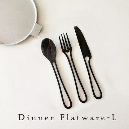 Trendha 304 Stainless Steel Cutlery Set - Sleek black finish, durable construction, and contemporary design for an elevated dining experience.