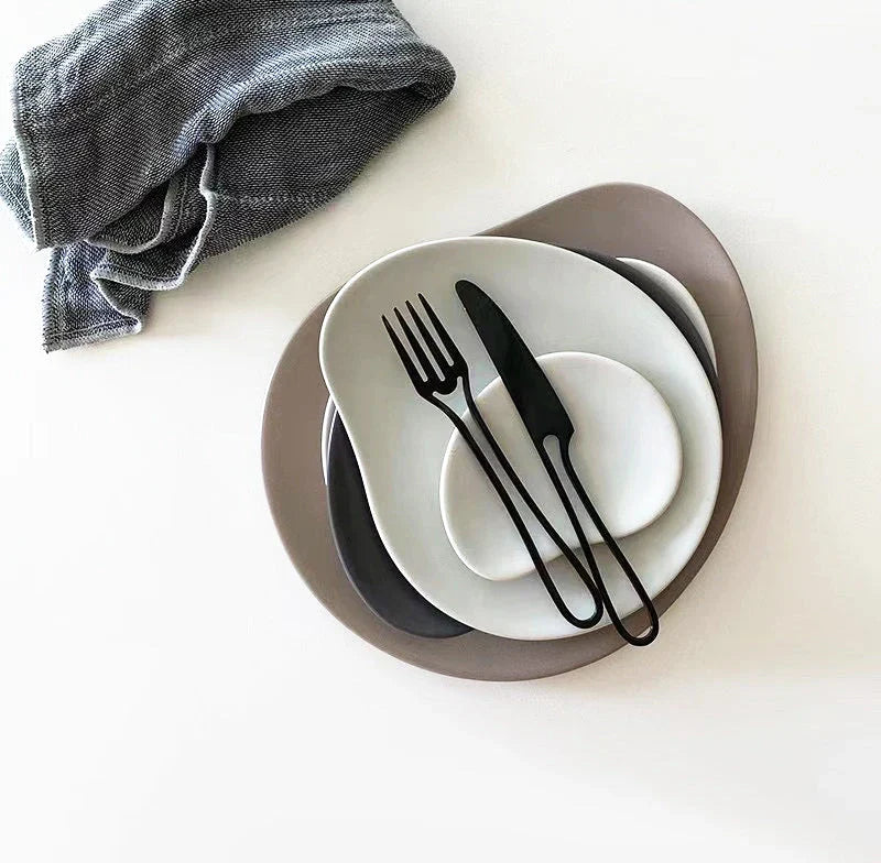 Trendha 304 Stainless Steel Cutlery Set - Sleek black finish, durable construction, and contemporary design for an elevated dining experience.