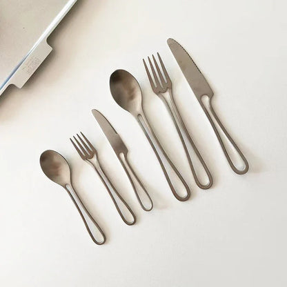 Trendha 304 Stainless Steel Cutlery Set - Sleek black finish, durable construction, and contemporary design for an elevated dining experience.