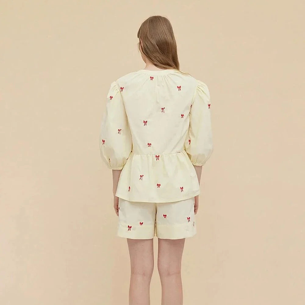 A stylish Bow Embroidery Shorts Set in breathable fabric, perfect for summer outings and events.