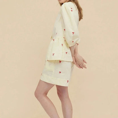 A stylish Bow Embroidery Shorts Set in breathable fabric, perfect for summer outings and events.