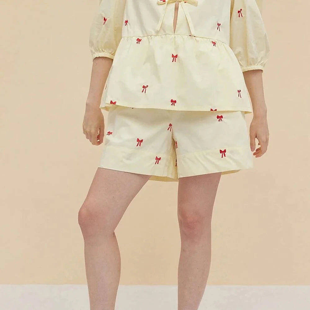 A stylish Bow Embroidery Shorts Set in breathable fabric, perfect for summer outings and events.