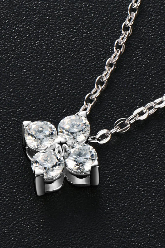 Moissanite four-leaf clover pendant necklace in sterling silver, a modern and elegant accessory with a touch of luck and charm.